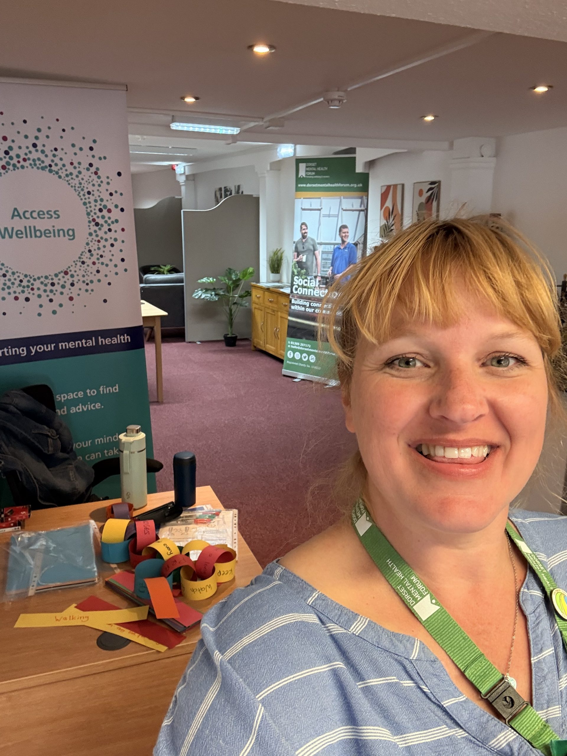 IMG_5572 Tia, a peer specialist standing inside the Access Wellbeing Weymouth building